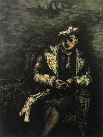 Seated Woman in a Straw Chair